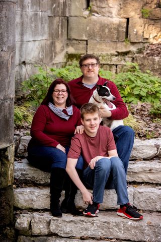 Jason with his family at home
